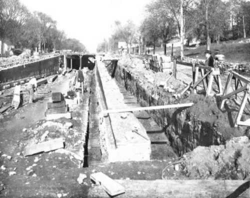 MOVING BRICK AND CONCRETE RETAINING WALL TO MAKE ROOM
FOR THIRD TRACK—BROADWAY AND 134TH STREET