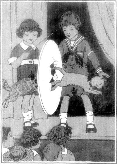 ONE OF THE TRICKS WAS TO RUN AND JUMP THROUGH A PAPER HOOP.
"The Curlytops and Their Pets"              Page 240