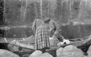 b. Ojibway Indians with birch bark canoes. North of Ely, Minn., 1899